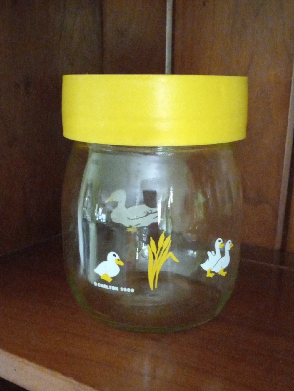 Vintage Carlton Yellow-Lidded Glass Jar with Duck Graphics